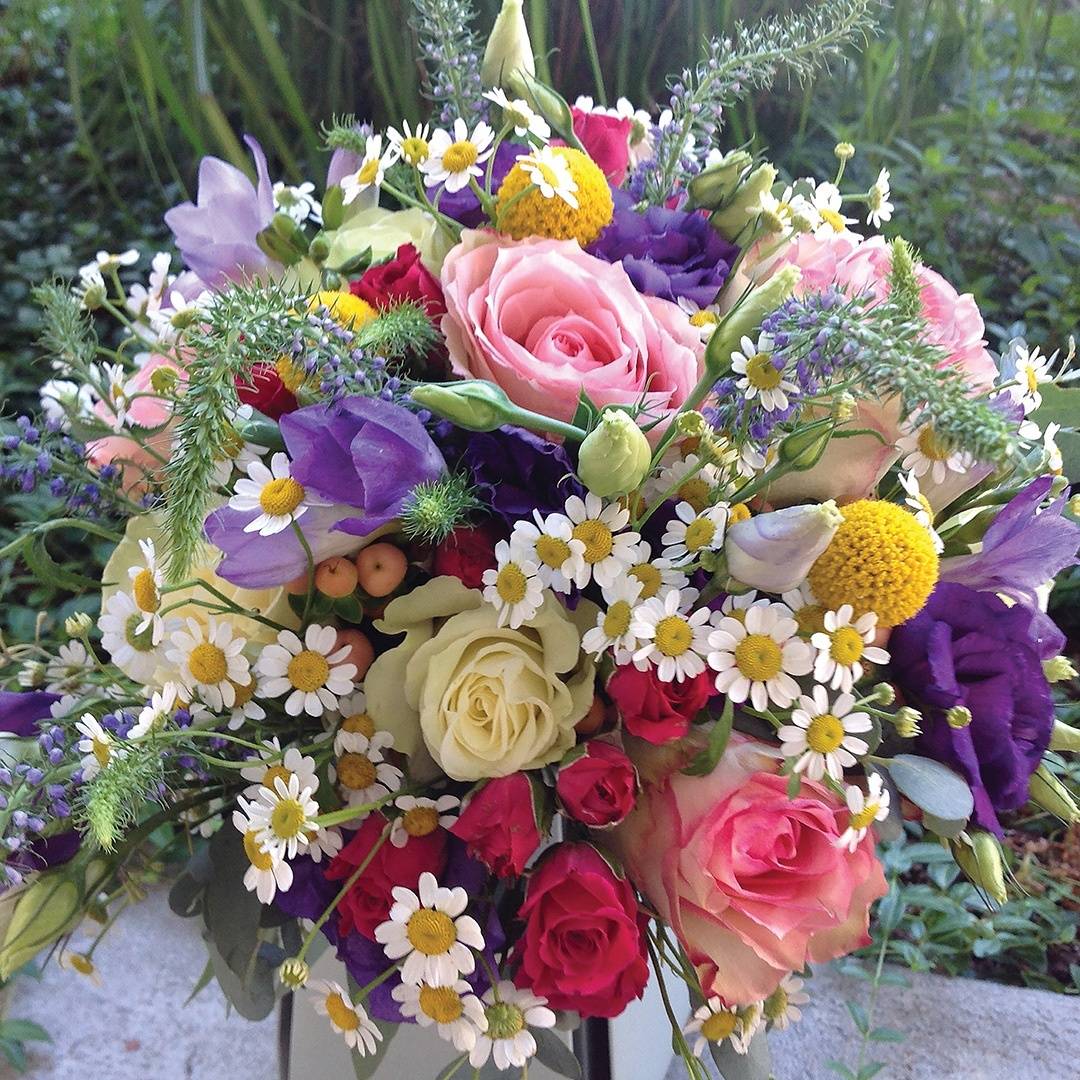 Premier Floral Design & Gift Emporium (photo of floral bouquet)